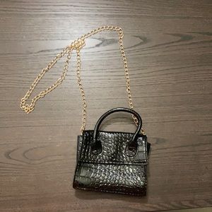 Tiny black purse